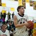 Dexter junior Brandon Bednarz grabs a rebound in the first half against Ypsilanti on Friday, Feb. 15. Daniel Brenner I AnnArbor.com